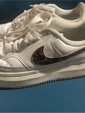 Nike White Leather Sneaker with Leopard-Print Swoosh